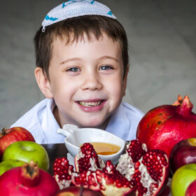 Child celebrating Rosh Hashanah